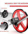 Close-up of 12 Inch Distance Measuring Wheel Collapsible Rolling Ruler for Construction with gear counter and readout display.