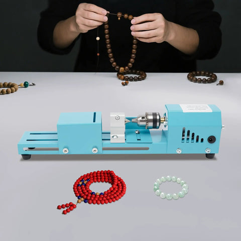 Compact Mini Wood Lathe And Milling Machine For Engraving Sanding Cutting Multi Purpose Tabletop Tool in use with bead crafting.