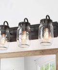 Farmhouse Mason Jar Vanity Light Fixtures In Oil Rubbed Bronze Finish above bathroom mirror