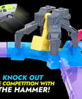 Shockout Circuit Playset Race And Battle On A Customizable Track With Micro Scale Cars featuring a hammer obstacle and micro car.