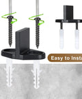 Four Pack Black T Shape Barn Door Floor Guides For Sliding Doors Bottom Track Hardware close-up with screws and guide slots