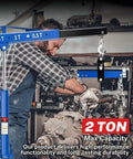 Professional Two Ton Folding Hydraulic Engine Hoist With Six Swivel Wheels And Adjustable Boom Cherry Picker lifting an engine part.