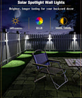 12 Pack Solar Fence Lights Slinging 50 Lumens Of Seriously Bright Glow Featuring Twelve Adjustable RGB Modes To Kick Up The Vibe On Your Patio Deck Or Backyard Railing Weatherproof Outdoor Lighting Solution Built To Last illuminated outdoor space with wall-mounted lights.