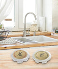 Upgrade Your Bathroom With These Stylish UrbanHui Acrylic Chrome Faucet Handle Cap Index Buttons. This 8 Piece Kit Includes Clear Hot Cold Indicators And Double Handle Sink Shower Knob Markers For Kitchen And Bathrooms, Featuring Precise 34 Inch Fit. close-up of 34 cm acrylic chrome hot cold faucet cap buttons on wood counter