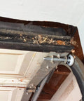 Close-up of 15 Pack 2 Inch Nylon Garage Door Rollers With Sealed 6200ZZ Bearings installed on a residential garage door track.