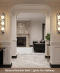 Natural Marble Bathroom Vanity Light, Alabaster 3-Light Wall Sconce on wall with purple-white veining, modern hallway design.