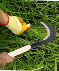 Heavy Duty Weeding Blade Hand Hoe For Gardening With Long Handle Manganese Steel Scythe Garden Tool in use on grass