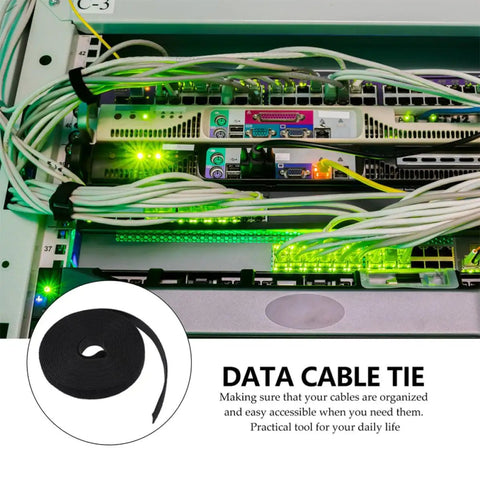 Reusable Black Cord Straps For Zero Fuss Cable Management And Electrical Wiring Featuring Heavy Duty Self Adhesive Backing securing wires in a tech rack.
