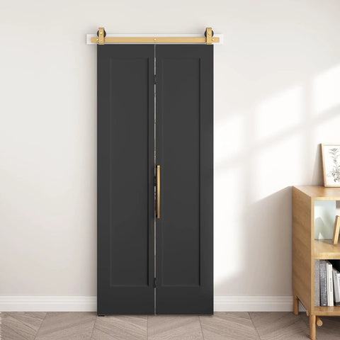 Ridiculously Tough 36 By 84 Inch Vinyl Wrapped Bifold Barn Door For Closet Pantry Laundry Room, sleek black finish with gold hardware.