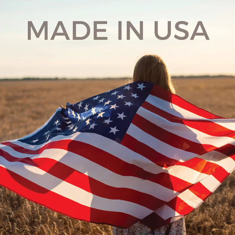 Person in field with USA flag draped over shoulders, text 'MADE IN USA' above