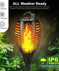 Close-up of Six Pack 51 LED Solar Torch Lights With Flickering Flame 23 Inch Tall Outdoor Garden Yard Pathway Tiki Torches Waterproof