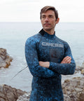 Man wearing Tokugawa 3mm Wetsuit For Spearfishing And Freediving With Blue Camouflage Nylon One Piece, Lightweight Flexible Fit Size XL