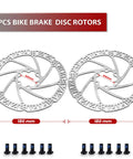 Front view: two 180mm silver bicycle brake rotors with 6-bolt pattern and mounting screws