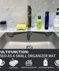 XXL 30 Inch Silicone Faucet Mat Splash Guard Drip Catcher Tray With Self Draining Slopes under various kitchen items on a sink