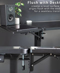 Boss Move Heavy Duty Clamp On Desk Extender With Foldable Keyboard Tray And Padded Wrist Support Expands Workspace For Sit Stand Tables Smooth Setup All Day Grind Black flush desk extension showing clamp attachment and adjustable supports.