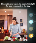 Woman preparing food under White Ambiance A19 LED Smart Bulb With 50,000 Tunable White Shades, Bluetooth And Zigbee Compatible