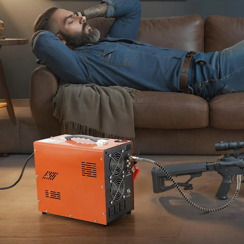 Heavy Duty Portable PCP Air Compressor Pump Crushes Four Thousand Five Hundred PSI with dual display near a man relaxing on a couch.