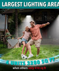 Family playing soccer under Ultra Lit Solar Flood Lights Outdoor 2000 Lumen With 140 Degree Motion Detection And 280 Degree Wide Beam 3280 Sq Ft Coverage 3 Modes 45Ft Motion Sensor Waterproof Garden Deck Lighting 4 Pack
