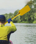 Man using Kids PVC Boat Paddle Prop For Water Sports Fun Yellow 50cm Lightweight Paddle Accessory On Lake