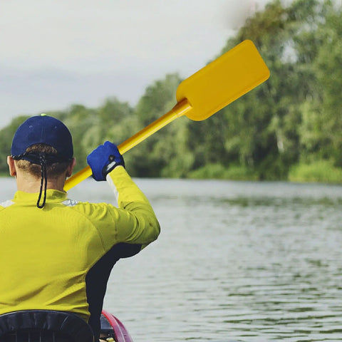 Man using Kids PVC Boat Paddle Prop For Water Sports Fun Yellow 50cm Lightweight Paddle Accessory On Lake