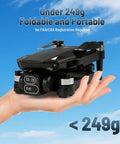 Hand holding foldable 4K HD FPV Mini Drone With Camera For Beginners, Brushless Motors, Altitude Hold, weighs under 249g