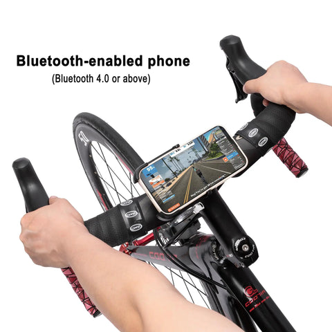 Cyclist using Smart Fluid Bike Trainer with phone connected to Zwift app display on handlebars, Ultra Quiet Indoor Cycling Stand