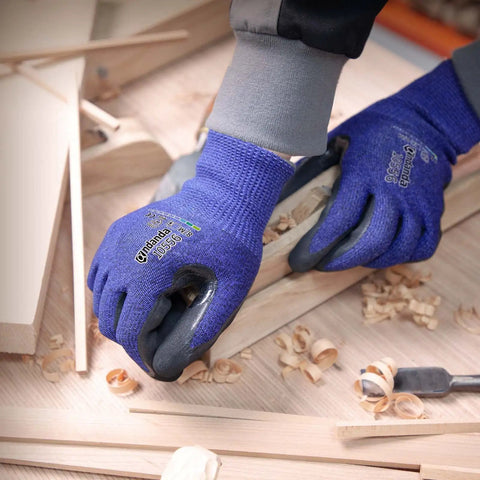 Level 5 Cut Resistant Work Gloves With Nitrile Palm Grip For Dry To Oily Surfaces being used in woodworking.