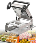 Top Notch Manual Food Sealing Machine For Sandwich Trays And Takeaway Boxes Delivers Fast Eight Seals Per Minute With Adjustable Heat Control on metal work surface.