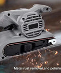 Heavy Duty Portable Tabletop Belt Sander And Polisher, 810W Motor for metal rust removal, close-up of sander in action.