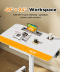 Flex Your Workspace Routine With This Slick Rollaway Standing Desk Featuring A Roomy Desktop Pull Out Storage Bin Built In Mug Holder Heavy Duty Side Hooks And Easy Glide Wheels, showing 40x24 inch tabletop with storage and mug holder.