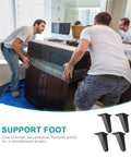Men installing a bathroom vanity using Adjustable Aluminum Alloy Cabinet Feet 10cm Leveling Legs for furniture support.