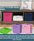 Eight Pack 11 Inch Rainbow Cube Storage Bins for playroom displayed in wooden shelf with extra bins on floor.