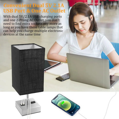 Two Pack 3 Way Dimmable Touch Table Lamps With USB Ports And AC Outlet, Night Light With Black Fabric Shade next to woman working