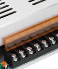 Close-up of Power Switch Driver For DC24V LED Strip Lights In Aluminum Alloy Housing showing connection terminals.