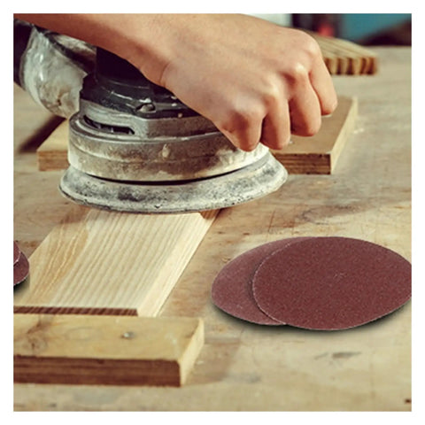 Top 100 Piece 3 Inch Sandpaper Discs With Super Grippy Backing Pads For Metal Wood And Plastic Polishing in use on wood surface.