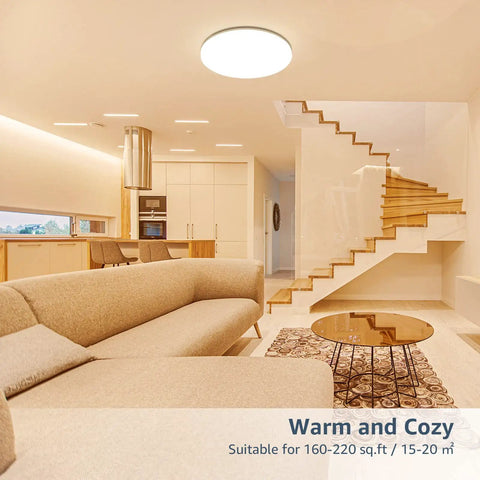Slim Flush Mount LED Ceiling Light 2400 Lumens in a modern living room, providing warm light over couch and stairs.