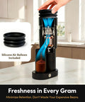 Premium Conical Burr Electric Coffee Grinder With Stepless Adjustment For Smooth Espresso Or Pour Over Brews showing silicone air bellows and ground coffee.