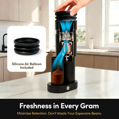 Premium Conical Burr Electric Coffee Grinder With Stepless Adjustment For Smooth Espresso Or Pour Over Brews showing silicone air bellows and ground coffee.