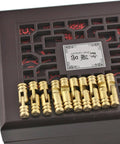 Close-up of 10 Piece Mini Brass Barrel Hinges Set For DIY Projects on a decorative box, 5x25mm, yellow brass