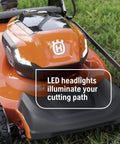 Battery Powered Self Propelled Lawn Mower With Brushless Motor For Small Yards 40V Lithium Ion Two 7.5Ah Batteries Charger Included Pro Grade Cut Long Runtime No Fuss Quick Start, orange mower with LED headlights