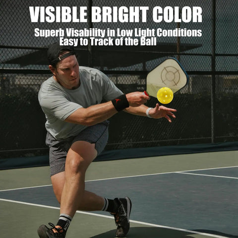 Player hitting outdoor pickleball ball with 40 holes for superior durability and stability, seamless design for repeated hits and high visibility