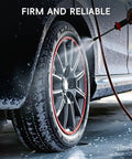 Pro Grade Black Wheel Rim Protectors Four Pack Universal Tire Edge Guards on alloy rim during washing with water spray.