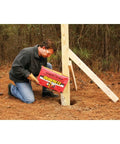 Man using Fast Setting Concrete Mix 50 Lbs Bag for quick set concrete projects, DIY friendly with easy installation, brown gray blend outdoors.