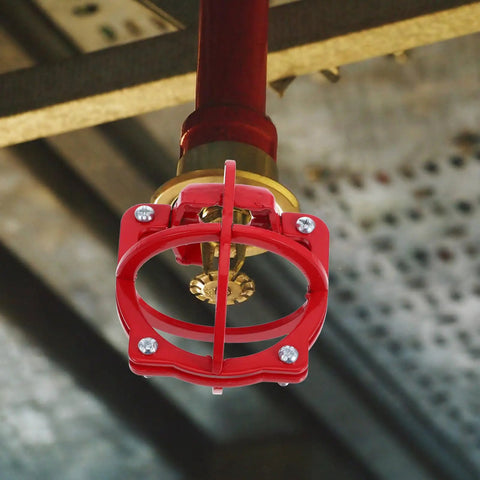 Bulldog Tough Fire Sprinkler Head Cage Guard and Protector for 1/2 Inch Iron Pipe in Bright Red Finish mounted on a ceiling pipe.