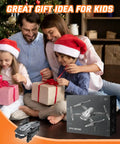 Family with Santa hats sitting by a Christmas tree, showcasing Mini Foldable FPV Drone With 1080P Camera For Kids And Adults.