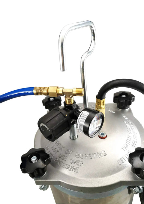 Top view of Stainless Steel 2.5 Gallon Pro Grade Pressure Paint Tank Spray Pot With Clamp On Lid featuring gauges and hoses.