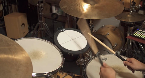 Drummer using USB C MIDI Drum Pad Controller With 4 MPE Zones Featuring Continuous Pressure Radius And Velocity 10 Inch Electronic Drum Pad For Hands Sticks Or Fingers Ultra Responsive Pro Grade Sensitivity With Adjustable Response Great For Live And Studio in a studio setup.