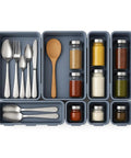 8 Piece Interlocking Drawer Organizer Trays Set In Light Gray Plastic, Modular Storage Bins with utensils and spices displayed