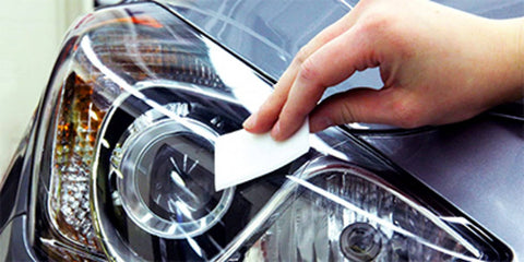 Ultra Headlight Restoration Kit With Masking Tape Sanding Discs Finishing Discs Refining Disc Wax Protectant And Clear Coat in use on car