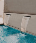 All-In-One Pond Waterfall Kit With LED Lights, 8-Inch Stainless Steel Spillway, in use over a pool edge